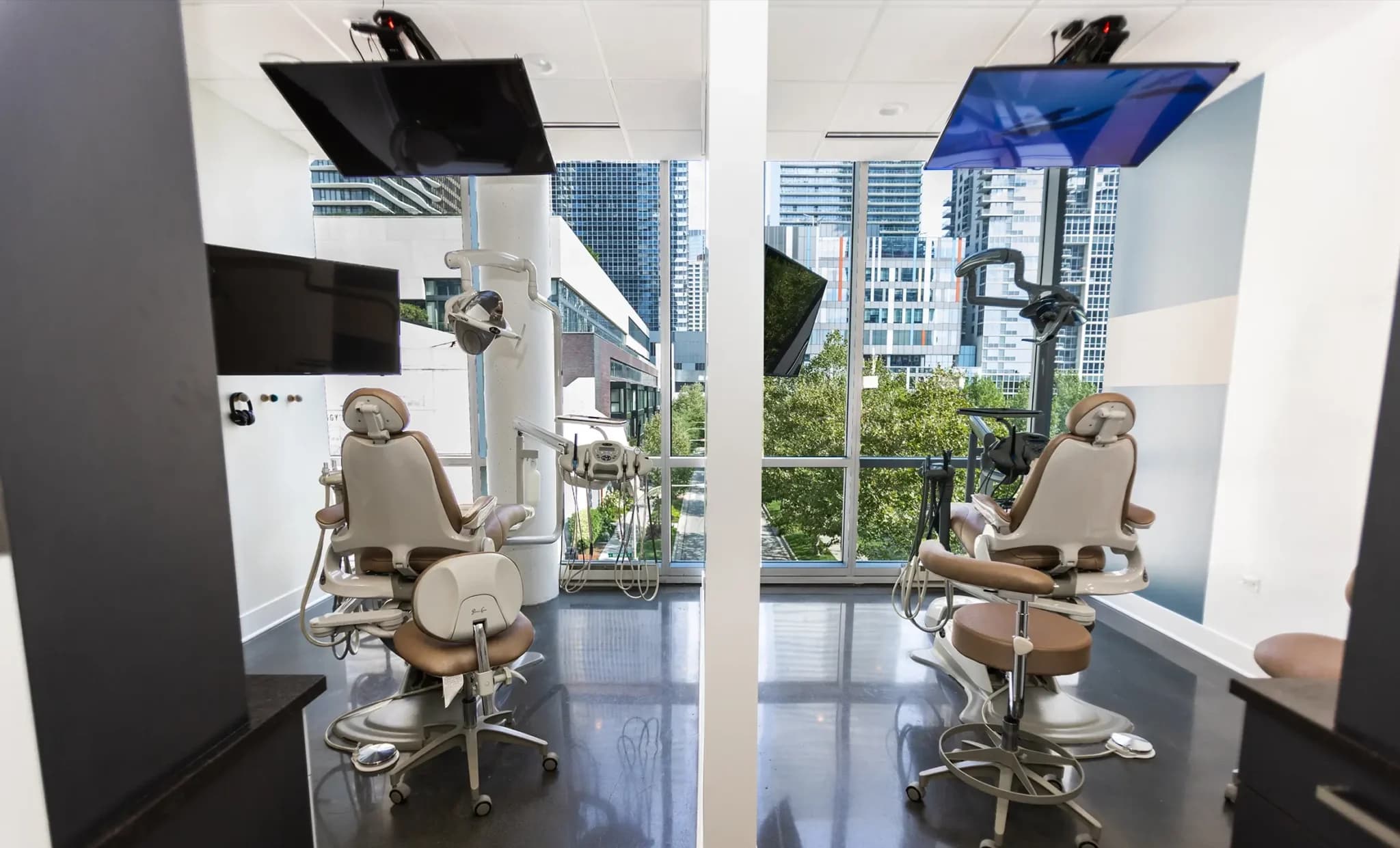 Two treatment rooms side by side, facing the window